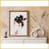 Butterfly art work framed placed on a cream cabinet with ornaments on either side